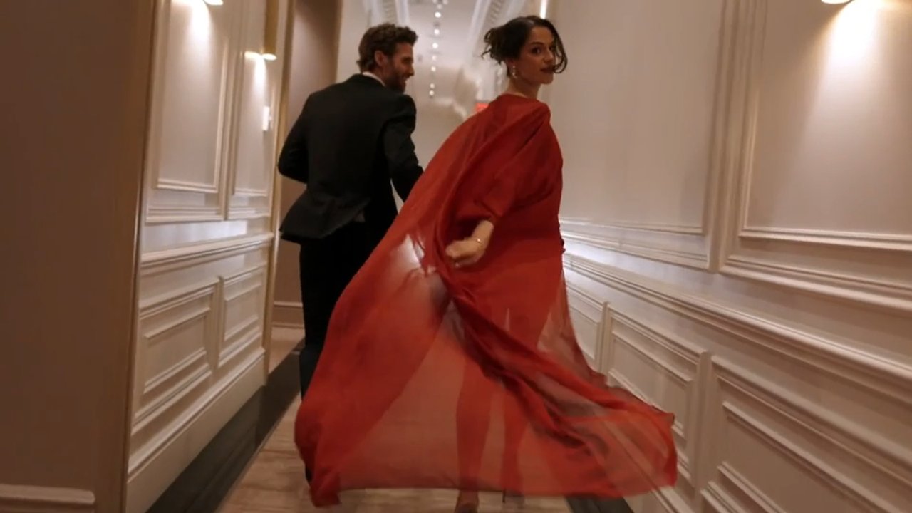 Couple walking down hallway