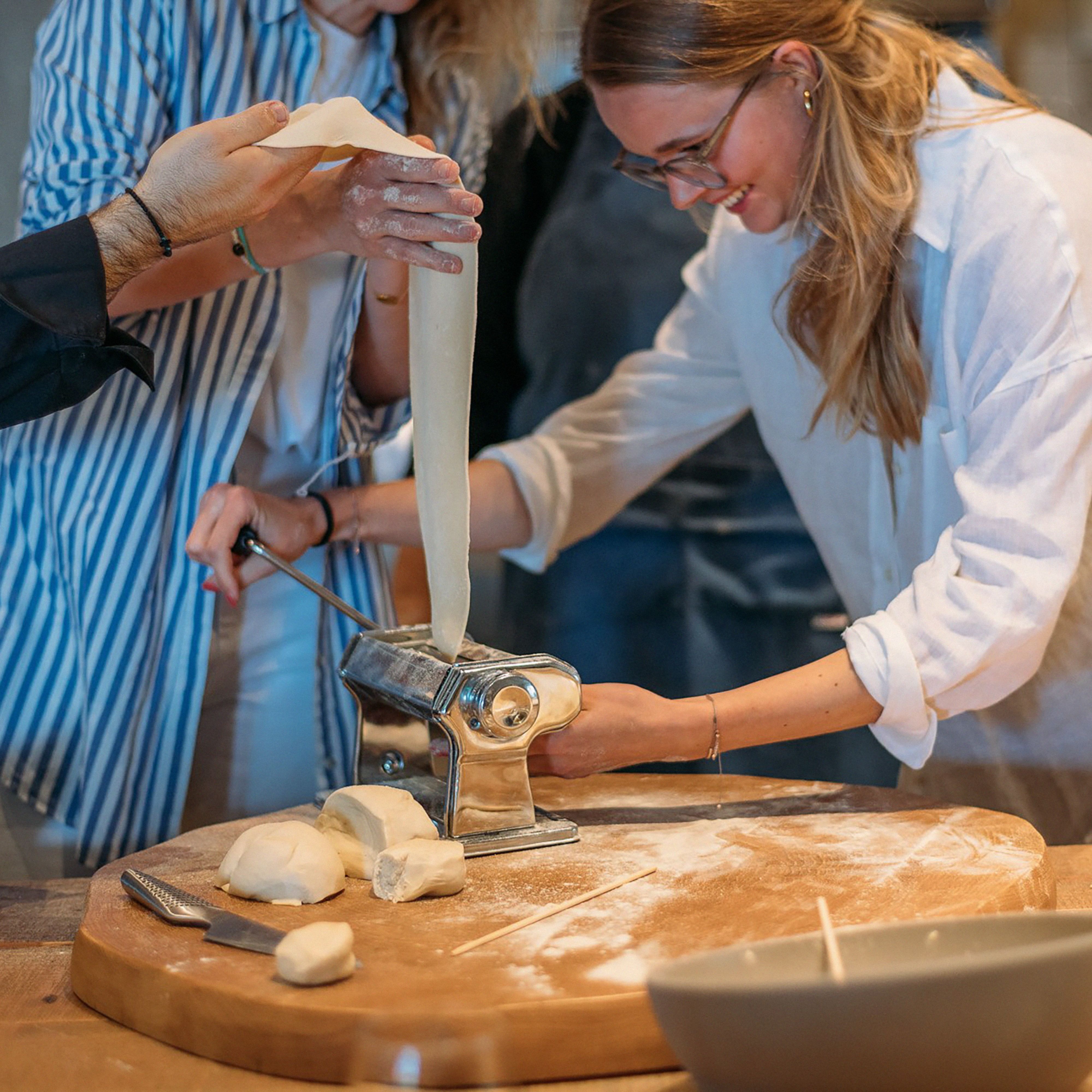 Cooking Class, woman rolling dough